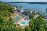 Drone view of Emerald Bay Condos, Tennis Court & 2nd Pool